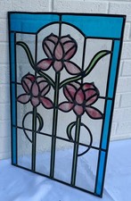 Stained Glass Window Panel, flowers are iridescent slag glass, vivid blue border