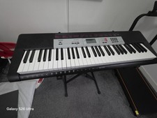 Casio CTK-1500 61 keys Digital Keyboard Piano with Power Adapter and stand