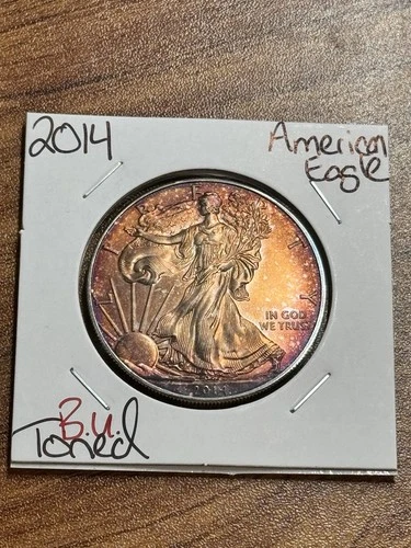 2014 AMERICAN SILVER EAGLE BU 1 OZ SILVER TONING TONED COIN (Raw16927) (AF)