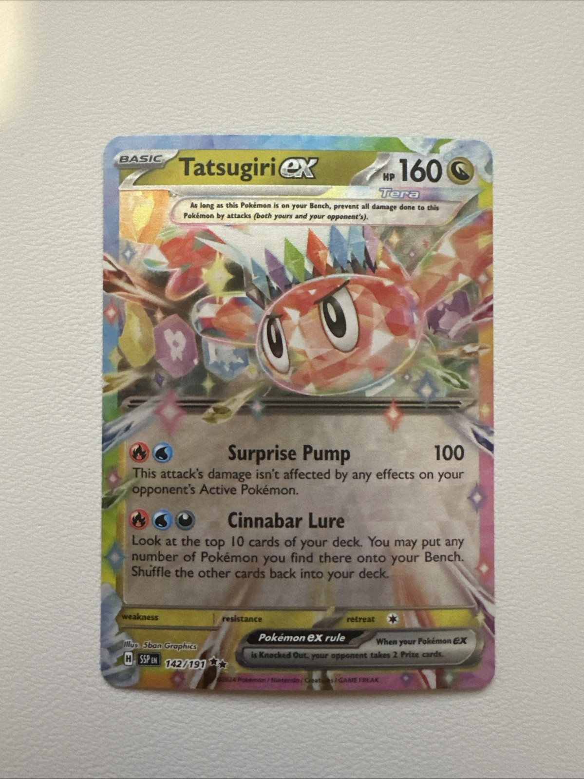Tatsugiri ex 142/191 Sv08: Surging Sparks Holo