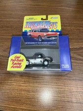 Johnny Lightning ThunderJet Chrome 1957 Corvette With Black Roof