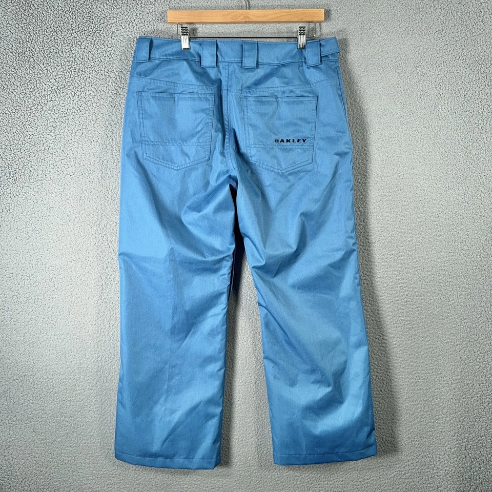 Pantalones de nieve Oakley grandes azules forrados con aislamiento impermeables esquí BioZone FN seco 10K Foto 2 de 4