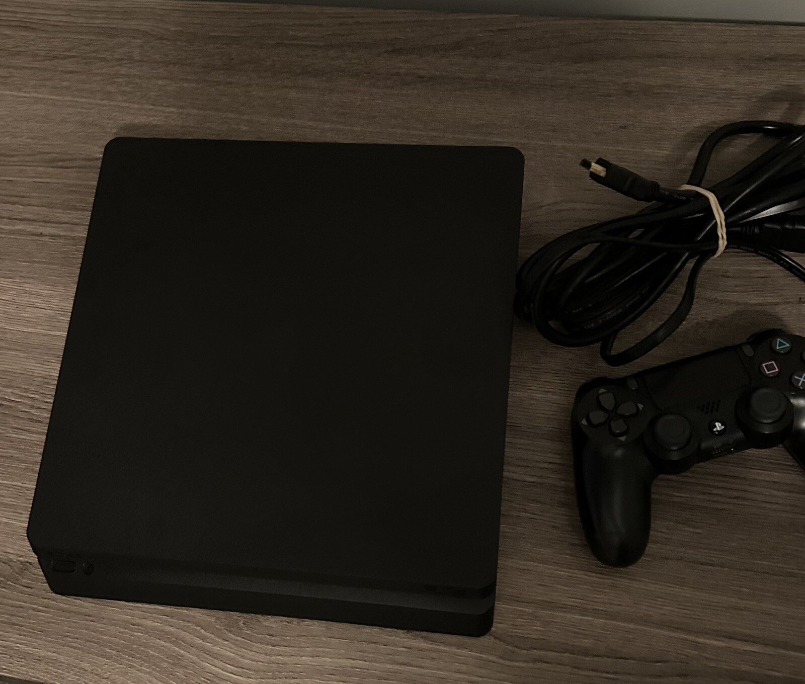 Sony PlayStation 4 Slim 1TB with DualShock Controller in Black