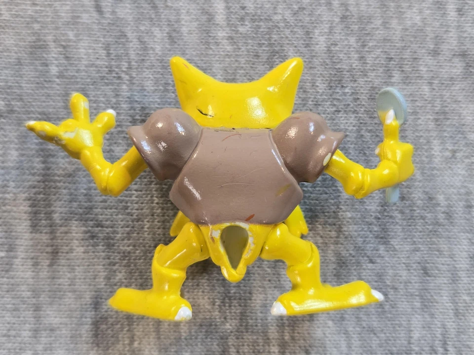Figura de acción Pokemon Kadabra 1998 Nintendo vintage amarillo 2,5" juguete coleccionable Foto 2 de 2