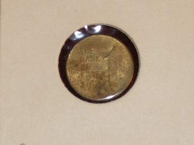1967 Korean 1 Won Coin.  Nice old brass coin.  Circulated, with shine & detailed
