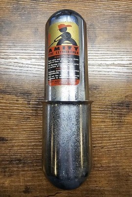 Vintage 1947 Amity Fire Extinguisher with wall mount