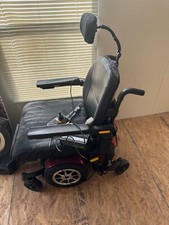 power wheel chair, red and black, brand new, never used.