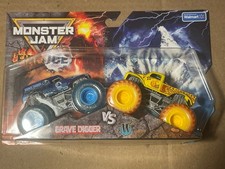 Monster Jam Fire and Ice Grave Digger vs Wildfire Walmart Exclusive 1:64 2 Pack