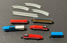 VINTAGE GALOOB MICRO MACHINES LOT OF TRAINS W/ TRACKS AS SHOWN AS IS