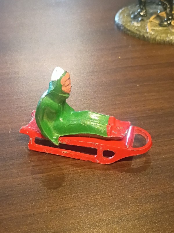 Vintage Barclay Metal Man Sitting On Sled Christmas Village