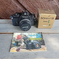 Nikon EM 35mm SLR Camera With 50mm f/1.8 Series E Lens Tested And Working