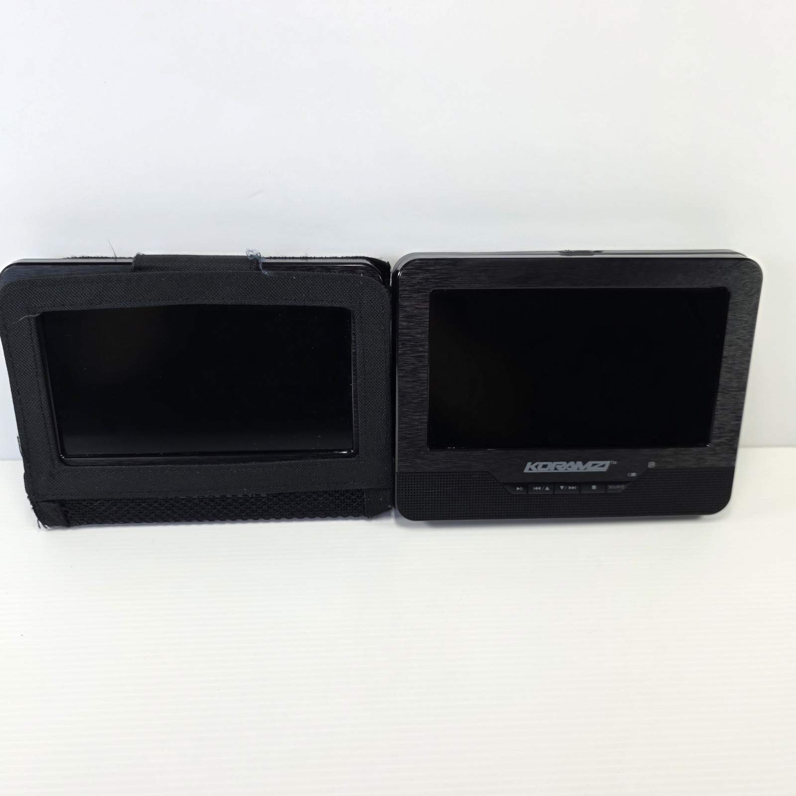 Koramzi PDVD-DS7 Portable 7" Dual Screen (One DVD) - No Cabl