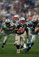 Kevin Faulk New England Patriots carries the ball v the Carolina P- 2004 Photo