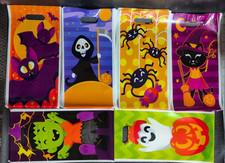 150 HALLOWEEN TRICK OR TREAT BAGS  PLASTIC GOODIE BAGS w/ HANDLE CANDY BAGS NEW