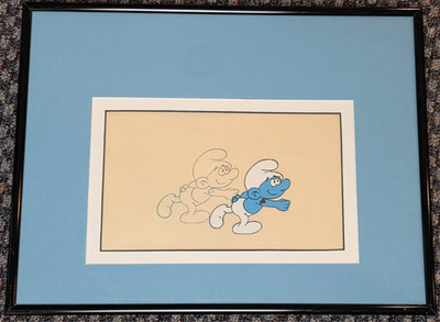 SMURFS PRODUCTION ANIMATION CEL AND DRAWING OF HEFTY SMURF FRAMED - SCREEN USED