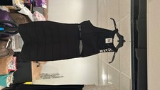 Black cocktail dress. Above the knee. Perfect for a wedding. Halter top. 