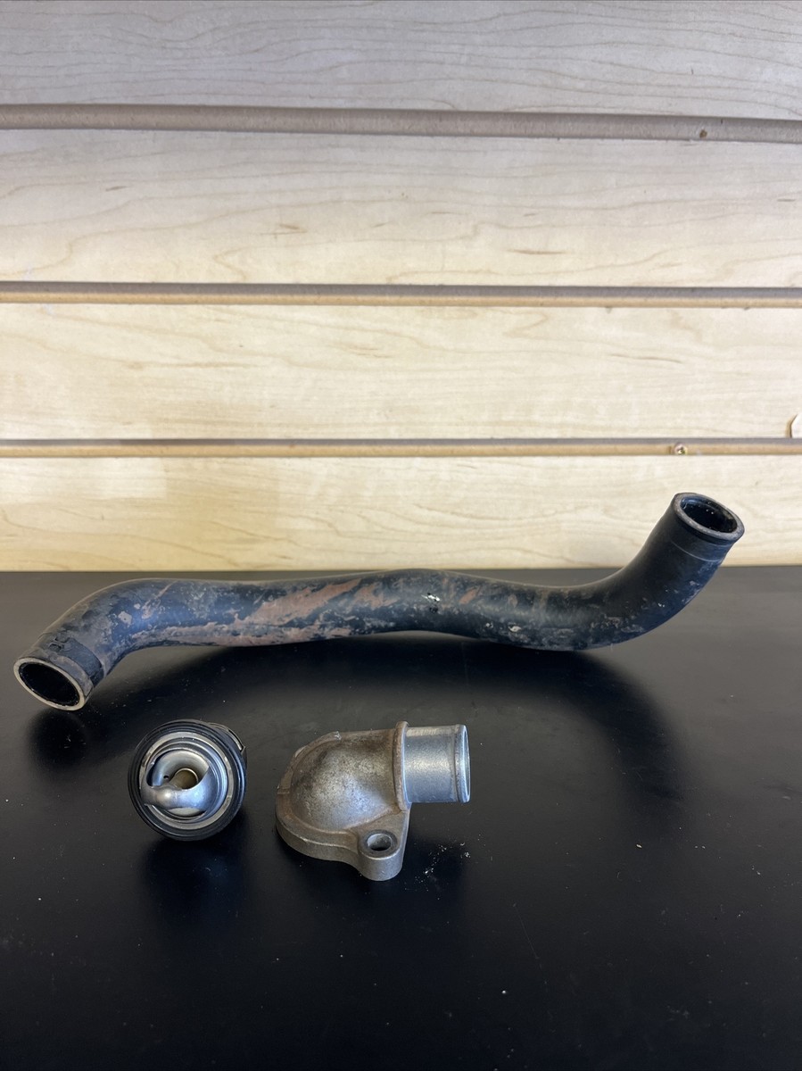 2003-2006 Kawasaki KFX 400 Thermostat , Housing Cover , and Hose