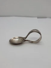 Holmes & Edwards .  Silver Plated baby spoon.  Bent/Curved handled.