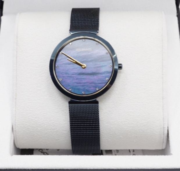 Bering Classic Dark Blue Womens Quartz Watch with Mother Of Pearl Dial 18132-399