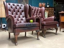 A GOOD PAIR OF VINTAGE REAL LEATHER CHAIRS CHESTERFIELD ARMCHAIRS