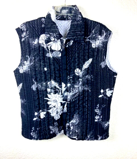 Chaleco acolchado reversible floral blanco y negro sin mangas UBU para mujer talla L Foto 2 de 4