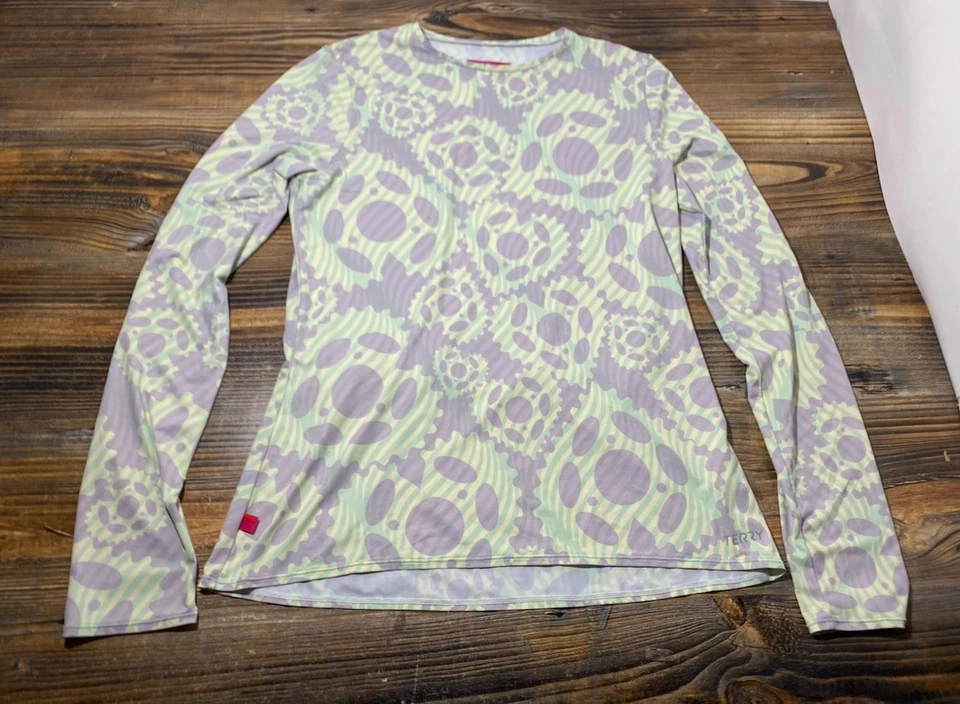 Top de ciclismo de manga larga con suela para bicicletas de rizo para mujer L cuello redondo UPF 50+ engranajes Foto 2 de 4