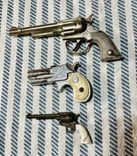 3 Vintage Toy Cap Guns Revolvers Nichols, Hubley Colt 45 Western 1950 s 1960 s