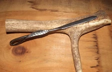 hand forged letter opener with leaf pattern