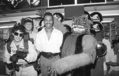 Musician Ray Parker Jr Poses with fans dressed as Ghostbusters gho- Old Photo
