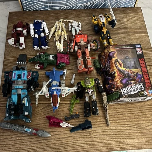 Lot of 10 Transformers plus weapons and accessories Hasbro