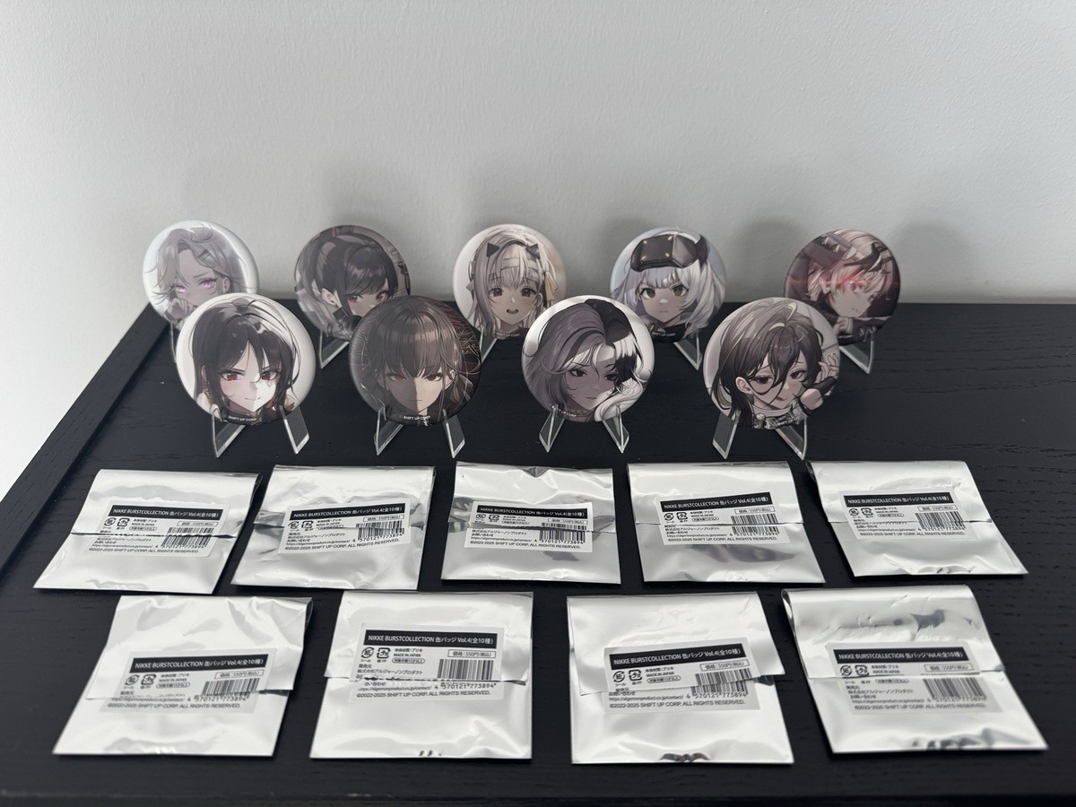 NIKKE Goddess Of Victory BURST Vol.4 Tin Pins Set Of Nine Open Box
