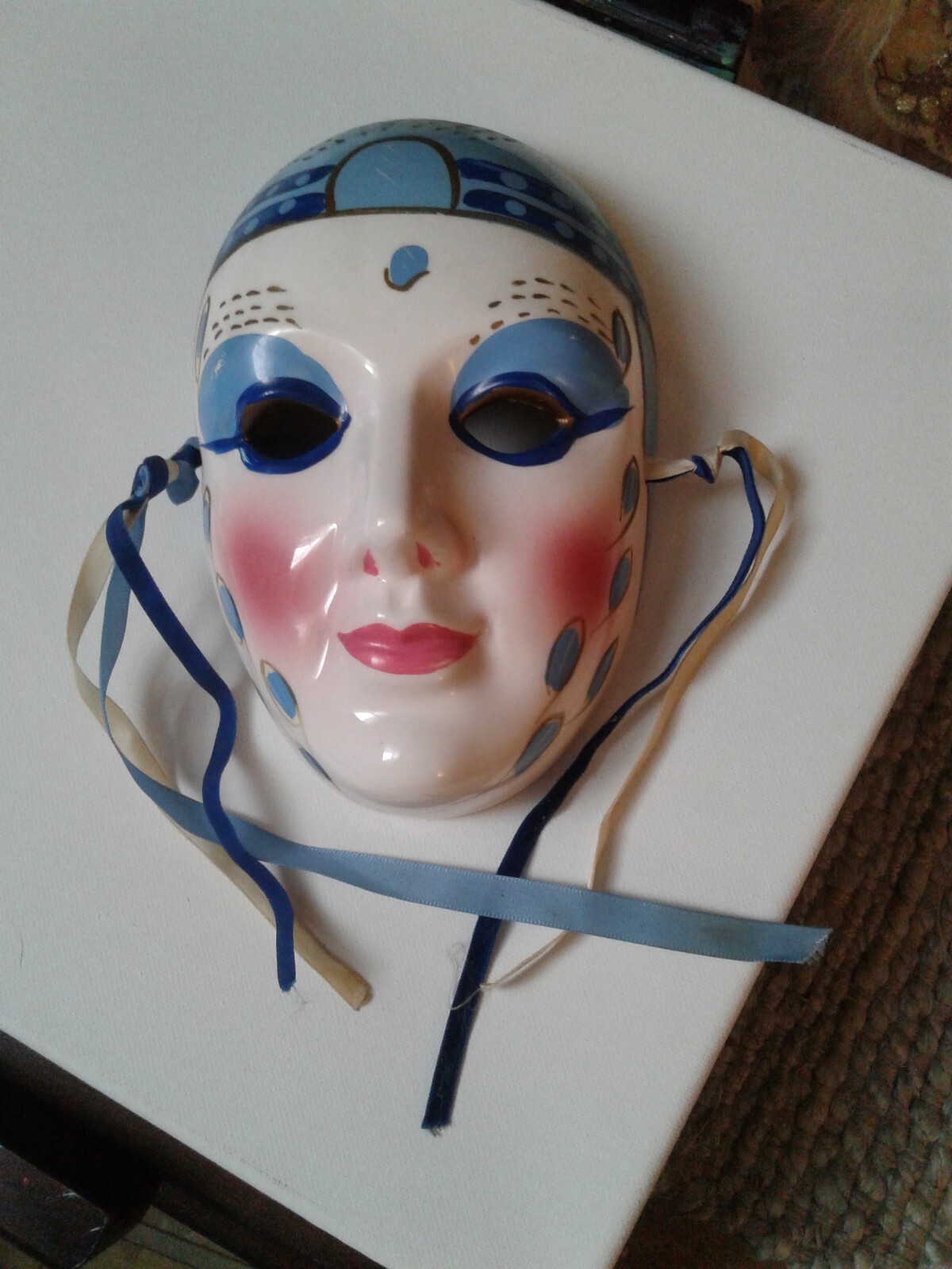 vintage face mask wall decor..BLUE AND WHITE PAINTED DECORATIVE WALL