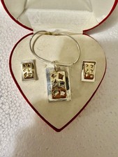 Sterling Silver Necklace and Earrings with an abstract pendant,geometric design