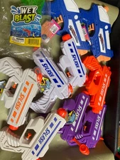 10 water guns all new with tags