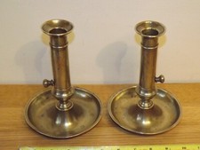 Antique 19thC. Pair Of French Brass Ejector Candlesticks With Drip Trays .