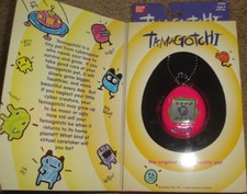 1996 - 1997 OPAQUE PINK ORIGINAL TAMAGOTCHI - NEW BANDAI 1800 - Vintage Green