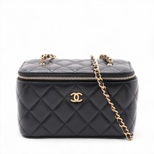 Borsa a tracolla Chanel Mini Matelasse pelle di agnello catena vanità nero oro metallo aderente