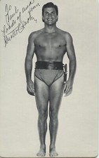 Crabbe, Buster. (1908–1983): Signed Photograph KING OF THE JUNGLE
