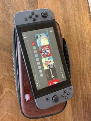 Nintendo Switch Console Full Kit + Zelda Case + 128GB microSD Excellent