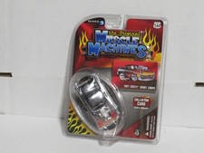 THE ORIGINAL MUSCLE MACHINES 1957 CHEVY SPORT COUPE DIECAST CAR 1/64 SERIES 3