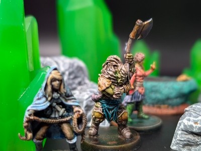 Well painted orc barbarian with axe d&d miniature