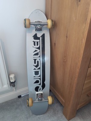 Powell Peralta Quicksilver Longboard mit Tracker Dart Trucks Skateboard