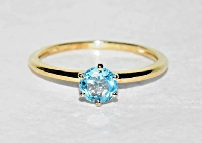 Schweizer Blautopas-Solitärring 9 kt Gold 5 mm 0,55 kt Größe N