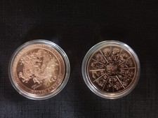 Two 1oz Copper Year of the Dragon Bullion Rounds in Capsules