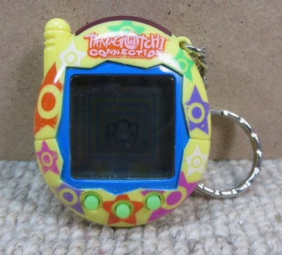 Vtg Tamagotchi Connection V3 Yellow Stars Big Virtual Pet Working Bandai 2004