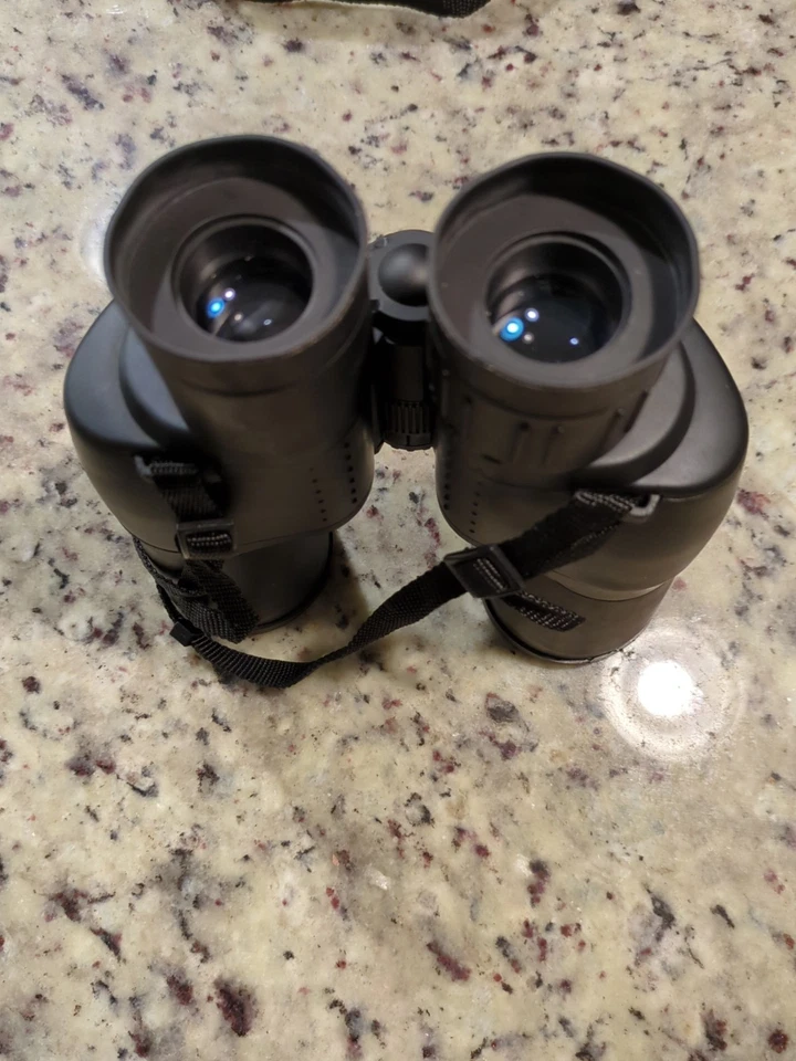 Binoculares Tasco 7x50mm 345FT/1000YTDS 112m/1000m con estuche Foto 2 de 3