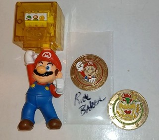 Rick Baker Autograph Nintendo Super Mario Token Coins & McDonald’s Slot Machine.