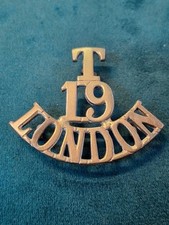 T 19 LONDON TERRITORIAL SHOULDER TITLE BADGE IN BRASS ON LUGS ORIGINAL