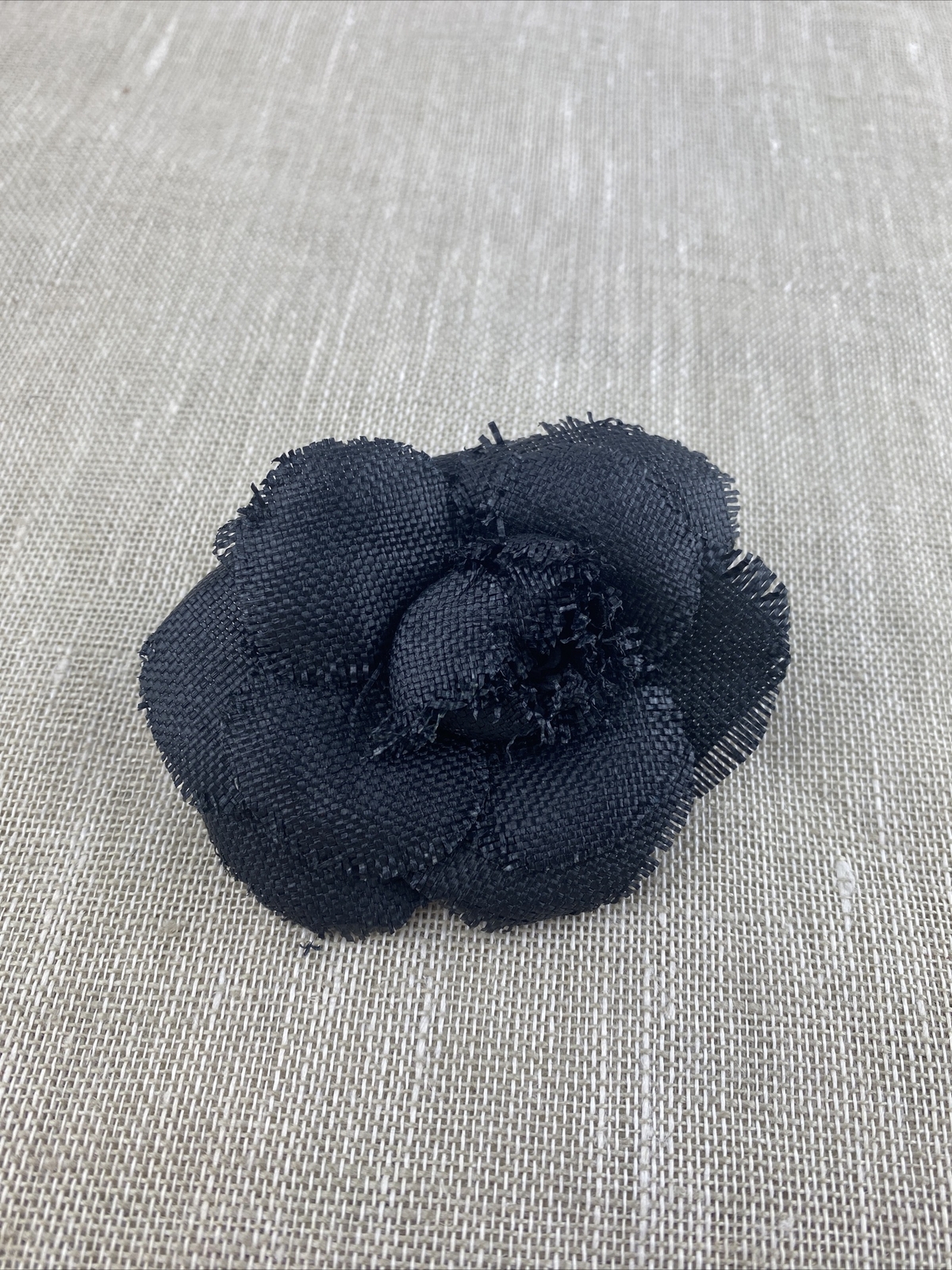 CHANEL black flower pin Gem