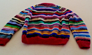 Hand knitted pure wool child's striped jumper fits 4 yrs